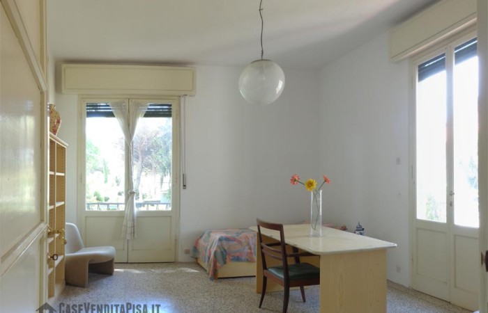 camera-da-letto-con-terrazza-e-stanza-armadi