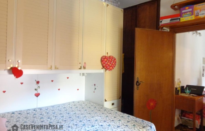 camera-con-armadio-a-muro