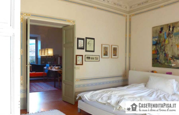 camera-piano-terra-con-accesso-diretto-a-studio-cucina