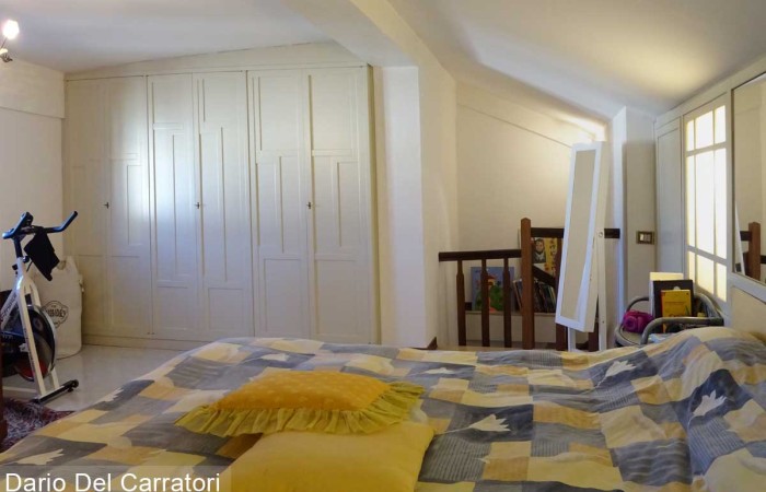 camera-matrimoniale-con-armadio-a-muro